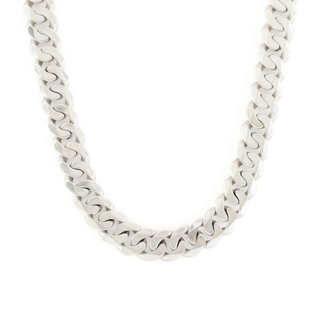 Very thick Silver 12mm curb chain necklace on a white background
